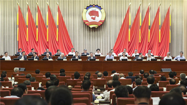 全国政协十三届常委会第二次会议开幕 汪洋出席