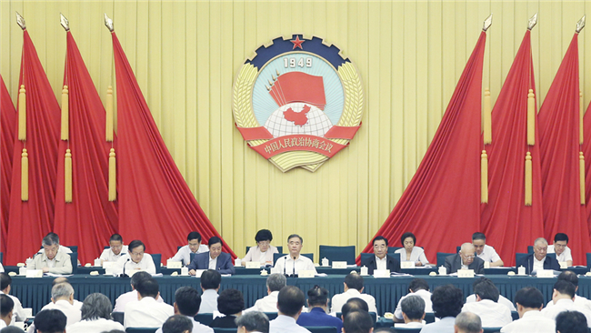 全国政协十三届常委会第三次会议举行全体会议 汪洋出席