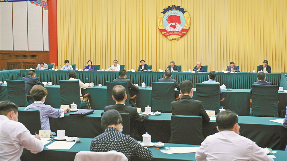 全国政协召开双周协商座谈会 围绕“促进港澳青年更好融入国家发展大局”协商议政 王沪宁主持