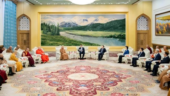 王沪宁会见中国佛教协会第十一次全国代表会议代表