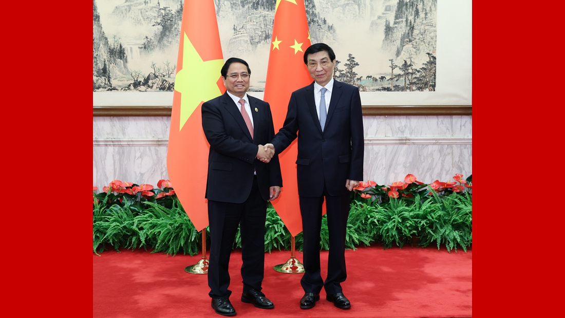 王沪宁会见越南总理范明政