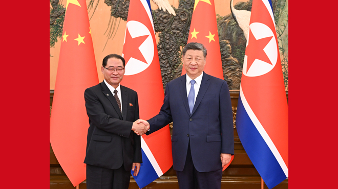 习近平会见朝鲜内阁总理朴泰成