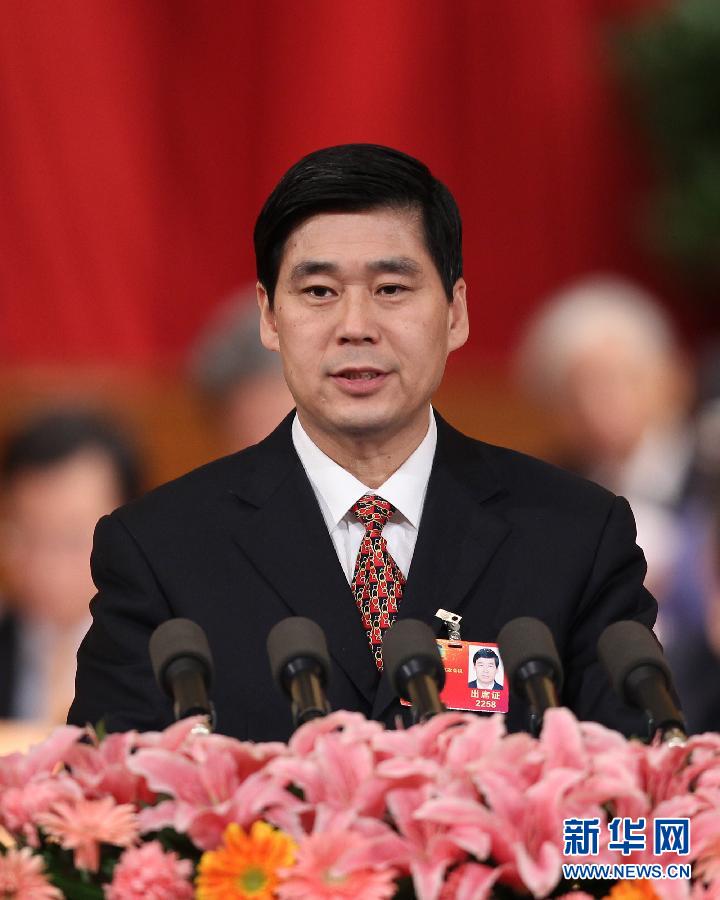 3月10日，全国政协十一届五次会议在北京人民大会堂举行第三次全体会议。这是钱学明委员作《解决拖欠农民工工资要对症下药》的发言。新华社记者 丁林 摄