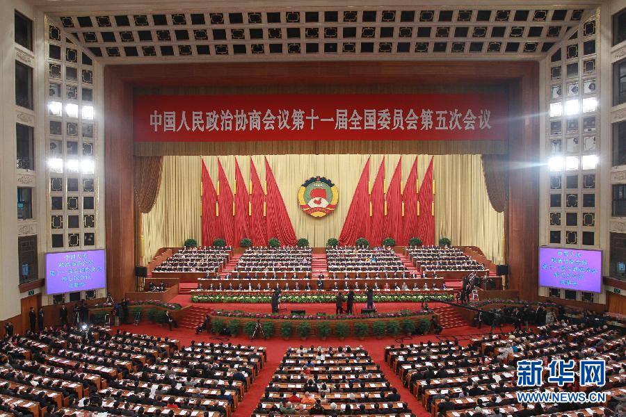 3月13日，中国人民政治协商会议第十一届全国委员会第五次会议在北京人民大会堂举行闭幕会。 新华社记者 丁林 摄