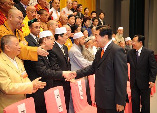 Jia Qinglin Met and Addressed Members of the First Plenary Session of the Third Committee of CCRP