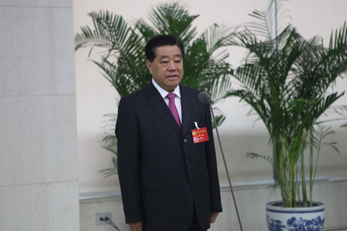中央政治局常委、全国政协贾庆林讲话。 程炜 摄