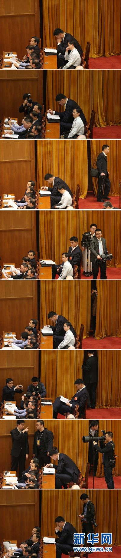 资料图片：3月3日，中国人民政治协商会议第十二届全国委员会第一次会议在北京人民大会堂开幕。为了容下姚明委员高大的身躯，会议方为他准备了一个特别的座位。姚明的座位恰好处在“交通要道”上，记者们来来往往，有的还“盯”上了他，但姚明委员始终专心听会，彰显“淡定姚”本色。 新华社记者 金立旺 摄