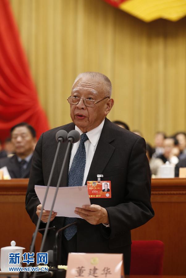 3月7日，全国政协十二届一次会议在北京人民大会堂举行第二次全体会议。董建华主持会议。 新华社记者 鞠鹏 摄