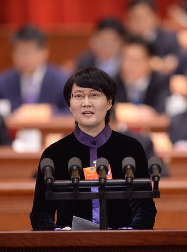 3月8日，全国政协十二届一次会议在北京人民大会堂举行第三次全体会议。这是蔡玲委员作《如何避免“八项规定”一阵风》的发言。新华社记者 王晔 摄